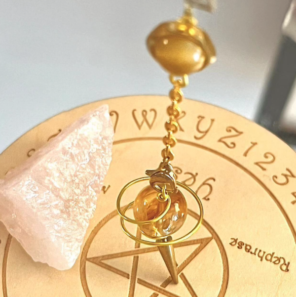 Handmade natural crystal pendulum